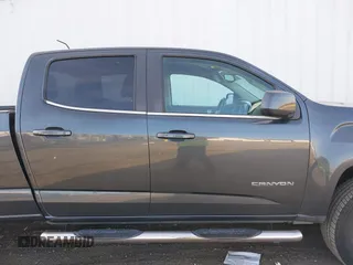 2015 GMC Canyon 2WD SLE with VIN 1GTG5BE35F1120622, listed as a IAAI auction lot 41421685 with 132,224 mi miles. Bid and sale history available at carsss.com. Image 13.