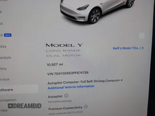 2023 Tesla Model Y Long Range with VIN 7SAYGDEE2PF874729, listed as a IAAI auction lot 41518376 with 10,927 mi miles and . Bid and sale history available at DreamBid. Image 7.