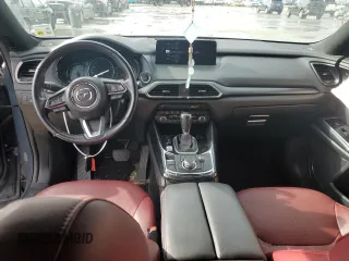 2021 Mazda CX-9 Grand Touring z VIN JM3TCADYXM0519757, wystawiony jako Copart lot #86665134 z przebiegiem 51 217 mil mil oraz Szkoda całkowita • Salvage title. Historia ofert i sprzedaży dostępna na DreamBid. Obrazek 8.