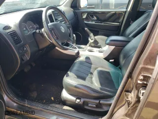 2006 Mercury Mariner Luxury with VIN 4M2YU56196KJ05583, listed as a Copart auction lot 71583784 with 80,592 mi miles and Salvage Title. Bid and sale history available at carsss.com. Image 7.