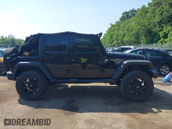 2015 Jeep Wrangler Unlimited Sport with VIN 1C4BJWDG2FL518487, listed as a IAAI auction lot 42593022 with 161,991 mi miles and . Bid and sale history available at DreamBid. Image 13.