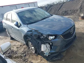 2015 Mazda CX-5 Touring with VIN JM3KE4CY8F0539341, listed as a IAAI auction lot 41937474 with 114,393 mi miles. Bid and sale history available at carsss.com. Image 1.