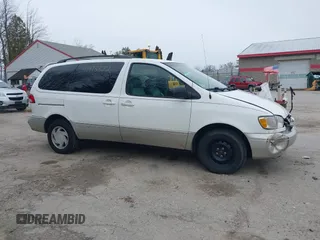 2000 Toyota Sienna LE with VIN 4T3ZF13C4YU233128, listed as a IAAI auction lot 41973322 with 117,577 mi miles. Bid and sale history available at carsss.com. Image 13.