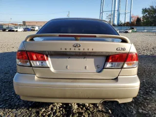 2002 Infiniti G20 Luxury z VIN JNKCP11A72T507242, wystawiony jako Copart lot #77325544 z przebiegiem 172 351 mil mil oraz Szkody całkowita. Historia ofert i sprzedaży dostępna na DreamBid. Obrazek 6.