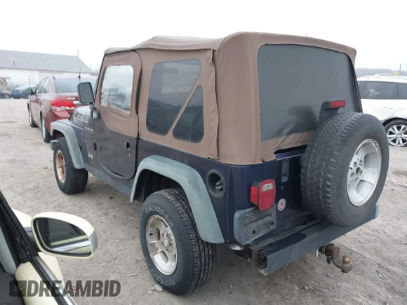 1998 Jeep Wrangler SE with VIN 1J4FY29P9WP792089, listed as a IAAI auction lot 41794793 with 200,838 mi miles. Bid and sale history available at carsss.com. Image 3.