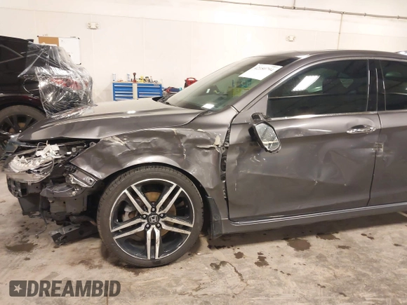 2016 Honda Accord Touring with VIN 1HGCR3F92GA029435, listed as a IAAI auction lot 42180794 with 132,658 mi miles and . Bid and sale history available at DreamBid. Image 19.