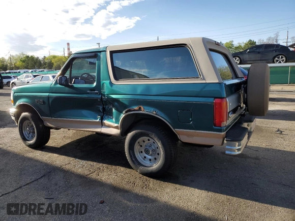1996 Ford Bronco Custom with VIN 1FMEU15H4TLB59116, listed as a Copart auction lot 52989015 with 210,464 mi miles and Salvage title. Bid and sale history available at DreamBid. Image 2.