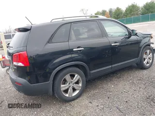 2012 Kia Sorento EX with VIN 5XYKU4A22CG251847, listed as a IAAI auction lot 42014433 with 166,186 mi miles. Bid and sale history available at carsss.com. Image 4.