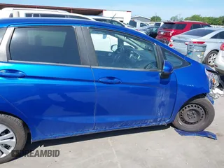 2016 Honda Fit LX with VIN JHMGK5H57GS003044, listed as a IAAI auction lot 42454501 with 132,272 mi miles and . Bid and sale history available at DreamBid. Image 13.