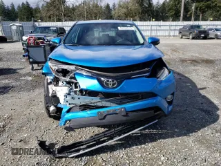 2018 Toyota RAV4 XLE with VIN 2T3RFREV3JW752934, listed as a Copart auction lot 48942015 with 74,182 mi miles and Salvage Title. Bid and sale history available at DreamBid. Image 5.