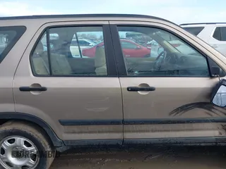 2006 Honda CR-V LX z VIN SHSRD78546U419783, wystawiony jako IAAI lot #41651042 z przebiegiem 162 131 mil mil oraz . Historia ofert i sprzedaży dostępna na DreamBid. Obrazek 13.