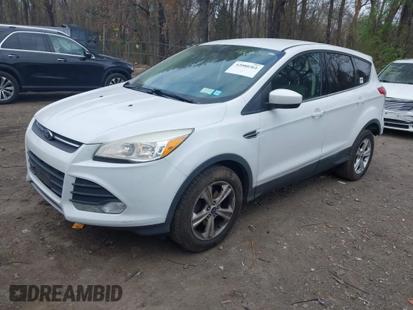 2013 Ford Escape SE with VIN 1FMCU0GX5DUA73931, listed as a IAAI auction lot 42080361 with 152,416 mi miles and . Bid and sale history available at DreamBid. Image 2.