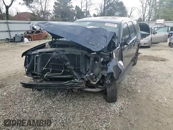 2014 Chevrolet Tahoe Commercial with VIN 1GNLC2E08ER209599, listed as a Copart auction lot 51018165 with 111,585 mi miles and Salvage title. Bid and sale history available at DreamBid. Image 10.