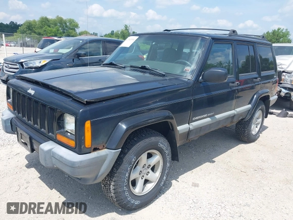 2000 Jeep Cherokee z VIN 1J4FF48S7YL273642, wystawiony jako IAAI lot #42743391 z przebiegiem 200 780 mil mil oraz . Historia ofert i sprzedaży dostępna na DreamBid. Obrazek 2.