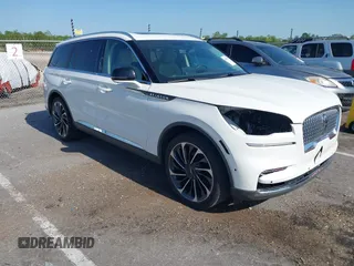 2023 Lincoln Aviator Reserve z VIN 5LM5J7WC8PGL07326, wystawiony jako IAAI lot #41995352 z przebiegiem 42 174 mil mil oraz . Historia ofert i sprzedaży dostępna na DreamBid. Obrazek 1.