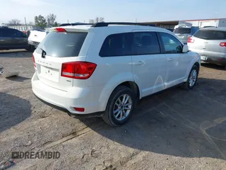 2014 Dodge Journey SXT with VIN 3C4PDCBG6ET189875, listed as a IAAI auction lot 40965845 with 174,292 mi miles and . Bid and sale history available at DreamBid. Image 4.