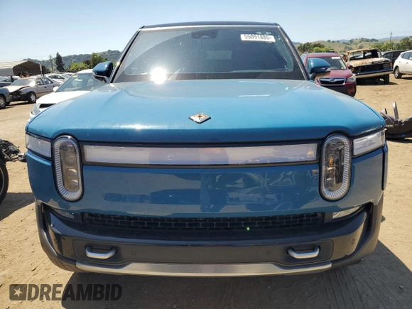 2024 Rivian R1S Adventure z VIN 7PDSGBBA0RN034793, wystawiony jako Copart lot #55091885 z przebiegiem 20 154 mil mil oraz Szkody całkowita. Historia ofert i sprzedaży dostępna na DreamBid. Obrazek 5.