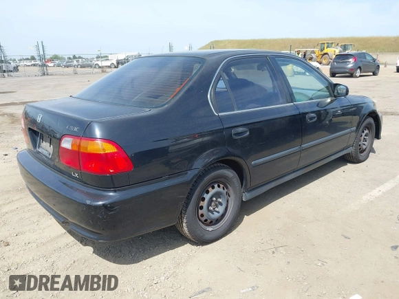 1999 Honda Civic LX with VIN JHMEJ6674XS003829, listed as a IAAI auction lot 42121298 with 238,936 mi miles. Bid and sale history available at carsss.com. Image 4.