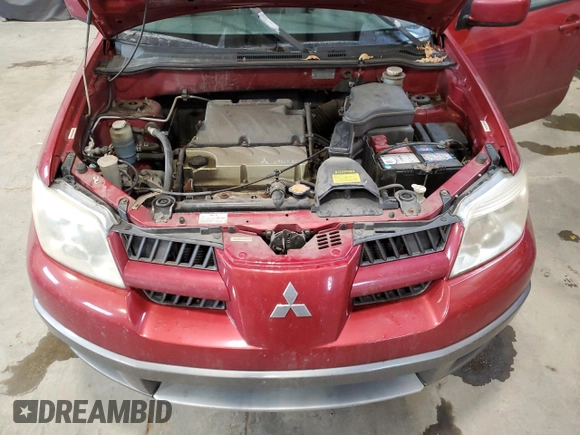 2005 Mitsubishi Outlander LS z VIN JA4LZ31F65U602175, wystawiony jako Copart lot #79650004 z przebiegiem 239 367 mil mil oraz Szkoda całkowita • Salvage title. Historia ofert i sprzedaży dostępna na DreamBid. Obrazek 12.