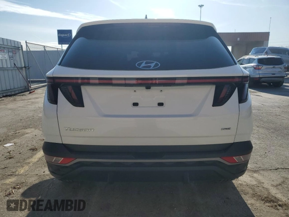 2022 Hyundai Tucson SEL z VIN 5NMJCCAE5NH160017, wystawiony jako Copart lot #52179635 z przebiegiem 26 061 mil mil oraz Szkoda całkowita • Salvage title. Historia ofert i sprzedaży dostępna na DreamBid. Obrazek 6.