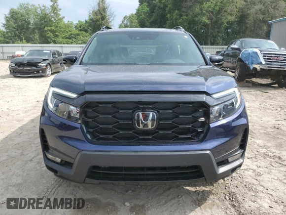 2023 Honda Passport Elite with VIN 5FNYF8H07PB036929, listed as a Copart auction lot 55981185 with 27,523 mi miles and Salvage title. Bid and sale history available at DreamBid. Image 5.