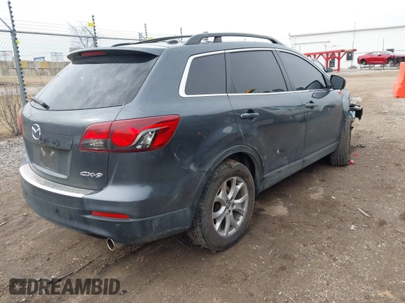2015 Mazda CX-9 Touring with VIN JM3TB2CA0F0463313, listed as a IAAI auction lot 41822436 with 145,302 mi miles. Bid and sale history available at carsss.com. Image 4.