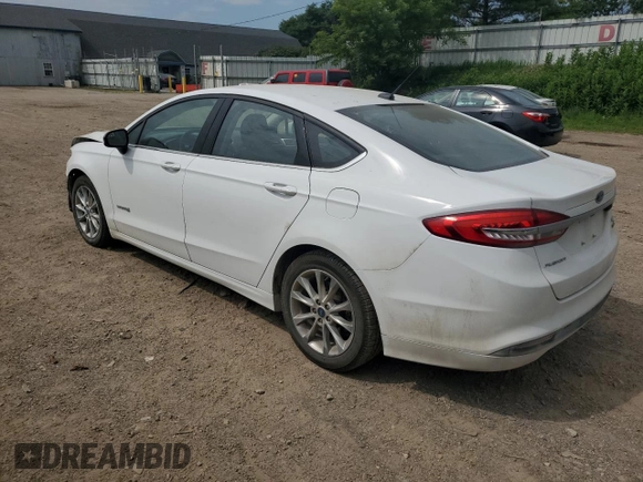 2017 Ford Fusion Hybrid SE с VIN 3FA6P0LU6HR305279, выставлен на аукционе Copart как лот 64864435 с пробегом 134 429 миль миль и Чистый • Clean title. История ставок и продаж доступна на DreamBid. Изображение 2.