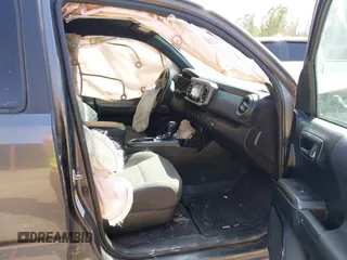 2016 Toyota Tacoma SR with VIN 5TFCZ5AN5GX010227, listed as a IAAI auction lot 41792719 with 228,070 mi miles. Bid and sale history available at carsss.com. Image 5.