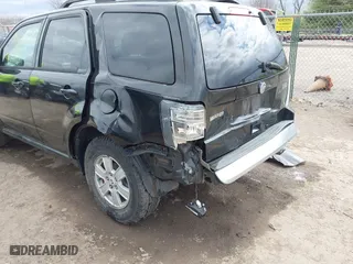 2011 Mercury Mariner with VIN 4M2CN8B7XBKJ01717, listed as a IAAI auction lot 42030587 with 115,766 mi miles. Bid and sale history available at carsss.com. Image 6.