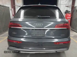2021 Audi Q5 Premium Plus z VIN WA1BAAFY6M2130300, wystawiony jako IAAI lot #42250661 z przebiegiem 49 147 mil mil oraz . Historia ofert i sprzedaży dostępna na DreamBid. Obrazek 16.