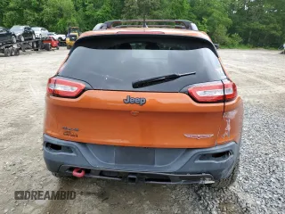 2016 Jeep Cherokee Trailhawk with VIN 1C4PJMBS2GW255368, listed as a Copart auction lot 59010305 with 105,667 mi miles and Salvage title. Bid and sale history available at DreamBid. Image 6.