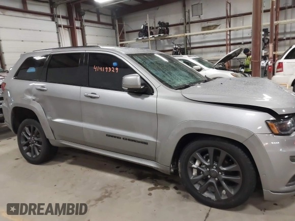 2018 Jeep Grand Cherokee High Altitude with VIN 1C4RJFCGXJC502580, listed as a IAAI auction lot 41419329 with 90,713 mi miles. Bid and sale history available at carsss.com. Image 13.