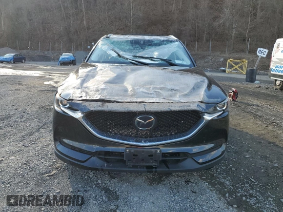 2018 Mazda CX-5 Touring with VIN JM3KFBCM3J0382258, listed as a Copart auction lot 50463005 with 61,887 mi miles and Salvage Title. Bid and sale history available at carsss.com. Image 5.