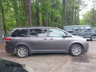 2011 Toyota Sienna XLE AAS with VIN 5TDYK3DC8BS016319, listed as a IAAI auction lot 42186294 with 293,401 mi miles and . Bid and sale history available at DreamBid. Image 13.