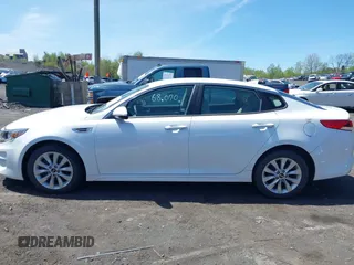2018 Kia Optima LX with VIN 5XXGT4L31JG261091, listed as a IAAI auction lot 42168652 with 68,070 mi miles. Bid and sale history available at carsss.com. Image 14.