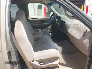 1999 Ford F-150 XL z VIN 1FTRX17LXXNB88516, wystawiony jako IAAI lot #42400493 z przebiegiem 254 085 mil mil oraz . Historia ofert i sprzedaży dostępna na DreamBid. Obrazek 5.