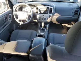 2005 Mazda Tribute i with VIN 4F2YZ02Z75KM57730, listed as a Copart auction lot 82480024 with 188,236 mi miles and Salvage Title. Bid and sale history available at carsss.com. Image 8.