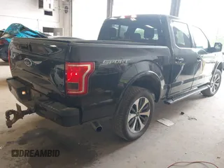 2015 Ford F-150 XLT with VIN 1FTEW1EPXFKE99354, listed as a IAAI auction lot 42245005 with 160,164 mi miles and . Bid and sale history available at DreamBid. Image 4.