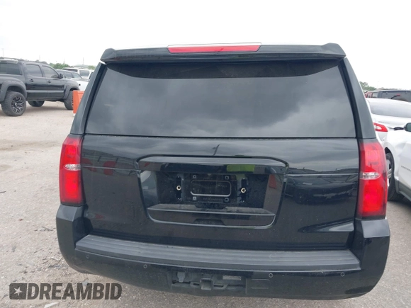 2018 Chevrolet Tahoe Commercial z VIN 1GNLCDEC6JR204921, wystawiony jako IAAI lot #42039630 z przebiegiem 96 008 mil mil oraz . Historia ofert i sprzedaży dostępna na DreamBid. Obrazek 16.