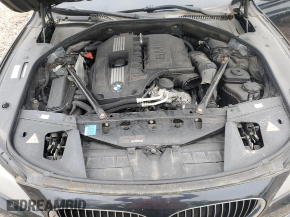 2011 BMW 7 Series 740Li with VIN WBAKB4C55BC574335, listed as a Copart auction lot 59947785 with 106,366 mi miles and Salvage title. Bid and sale history available at DreamBid. Image 11.
