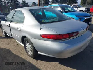 1996 Mercury Sable GS with VIN 1MELM50U5TG605997, listed as a IAAI auction lot 41751266 with 179,662 mi miles. Bid and sale history available at carsss.com. Image 3.