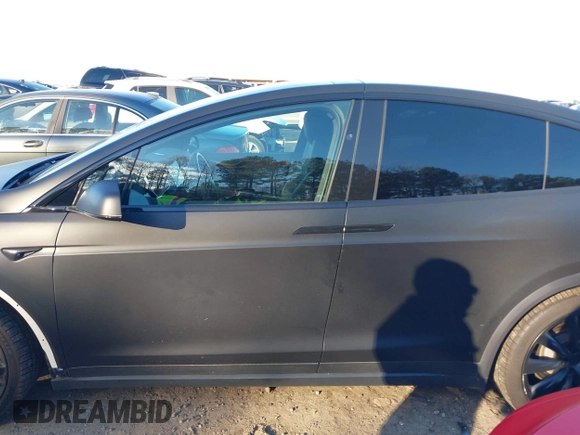 2020 Tesla Model X Long Range with VIN 5YJXCDE28LF298553, listed as a IAAI auction lot 40863184 with 54,031 mi miles and . Bid and sale history available at DreamBid. Image 14.