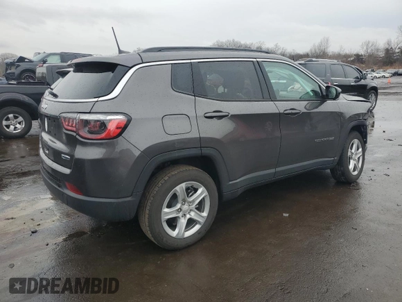 2023 Jeep Compass Latitude with VIN 3C4NJDBN4PT504602, listed as a Copart auction lot 46733985 with 10,223 mi miles and Salvage title. Bid and sale history available at DreamBid. Image 3.