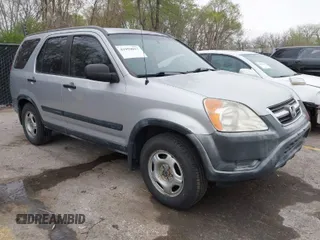 2002 Honda CR-V LX with VIN JHLRD68422C015173, listed as a IAAI auction lot 41959037 with 217,058 mi miles and . Bid and sale history available at carsss.com. Image 1.