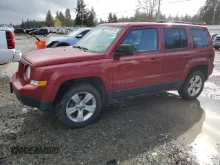 2014 Jeep Patriot Latitude with VIN 1C4NJRFB1ED651525, listed as a Copart auction lot 52526975 with 135,088 mi miles and Salvage Title. Bid and sale history available at carsss.com. Image 1.