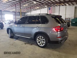 2012 BMW X5 35i z VIN 5UXZV4C5XCL767234, wystawiony jako Copart lot #64117285 z przebiegiem 187 969 mil mil oraz Czysty tytuł • Clean title. Historia ofert i sprzedaży dostępna na DreamBid. Obrazek 2.
