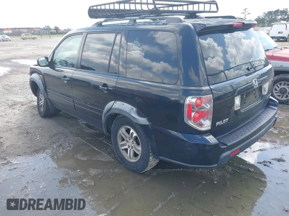 2006 Honda Pilot EX-L with VIN 2HKYF18506H530715, listed as a IAAI auction lot 42195804 with 252,295 mi miles and . Bid and sale history available at DreamBid. Image 3.