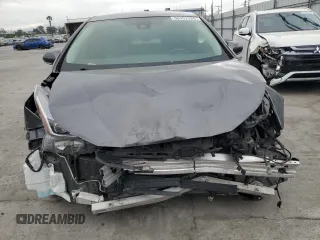 2021 Toyota Prius L Eco with VIN JTDKAMFU8M3130779, listed as a Copart auction lot 56452395 with 86,094 mi miles and Salvage title. Bid and sale history available at DreamBid. Image 5.