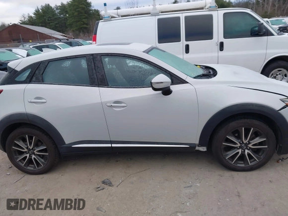 2016 Mazda CX-3 Grand Touring with VIN JM1DKFD7XG0132084, listed as a IAAI auction lot 41004954 with 70,476 mi miles. Bid and sale history available at carsss.com. Image 13.