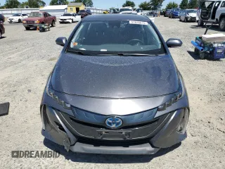 2021 Toyota Prius LE z VIN JTDKAMFPXM3190346, wystawiony jako Copart lot #57626675 z przebiegiem 102 786 mil mil oraz Szkoda całkowita • Salvage title. Historia ofert i sprzedaży dostępna na DreamBid. Obrazek 5.